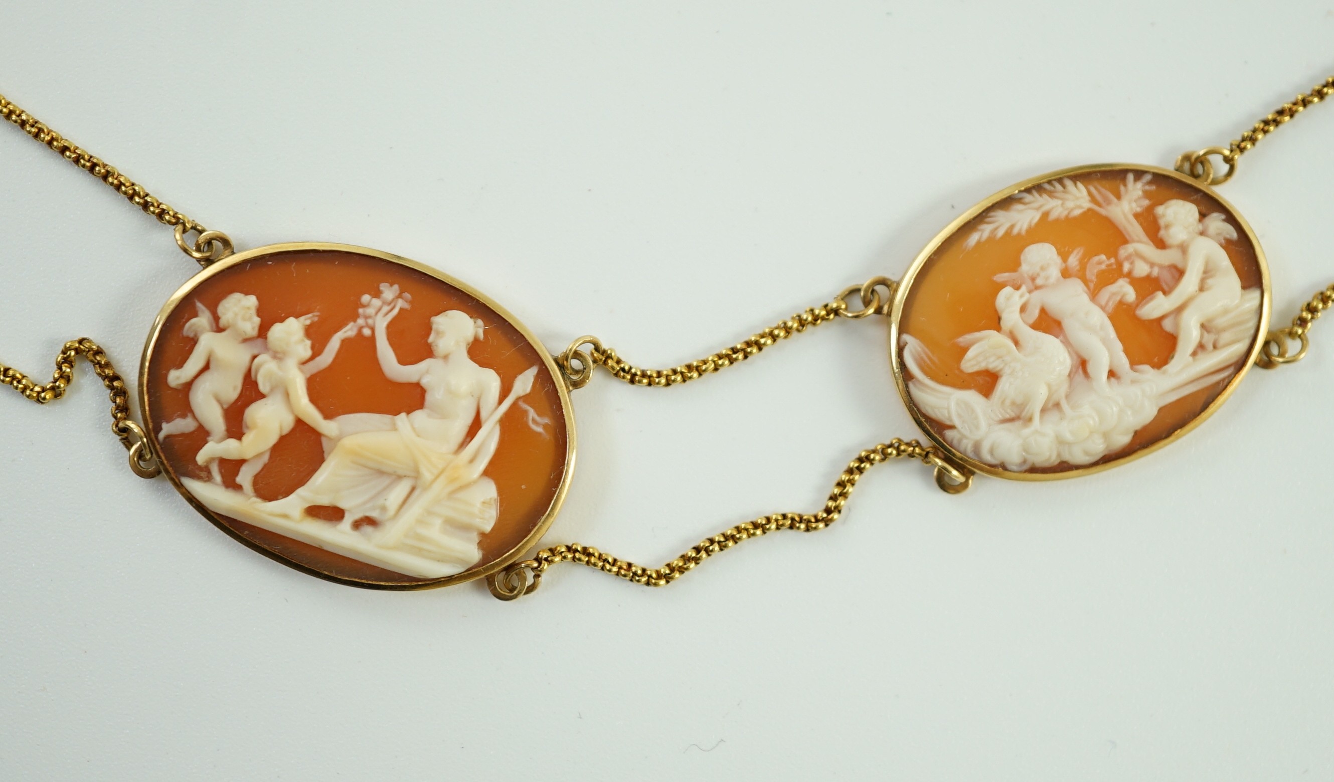 A late Victorian gold and graduated oval cameo shell necklace